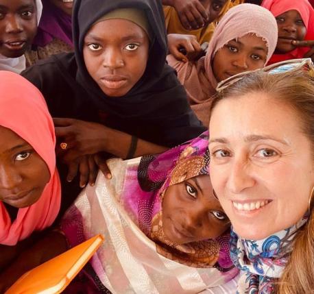 Sara Bordas Eddy, Chief of Humanitarian Field Support, UNICEF Office of Emergency Programs, with children in Sudan.