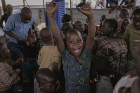 Amani, 9, plays in a child-friendly space set up by UNICEF and its partners in Rusayo camp, Nyirangongo territory, north of the city of Goma, Democratic Republic of Congo, July 21, 2023.