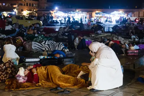 Residents stay out at a square in Marrakesh, Morocco on September 9, 2023, after an earthquake.