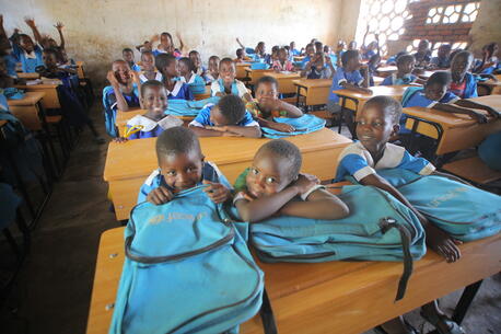 Students sit at their desks, provided by the K.I.N.D. Fund, at Kalima Primary School in Malawi in October 2023..
