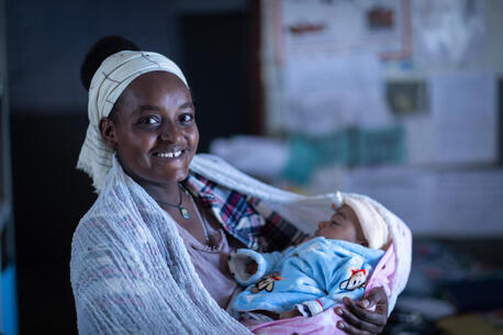Kokobe Ashebir, 20, brings her 2-month-old baby for a routine check-up at Kolabe Bale Health Post in Sire, Oromia Region, Ethiopia. 