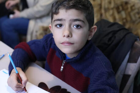 A UNICEF-supported social worker helps 9-year-old Noy in Armenia overcome his anxiety.