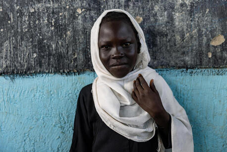 A student celebrates her graduation day at Taffari Community School in the Taffari IDP camp, South Kordofan, Sudan.