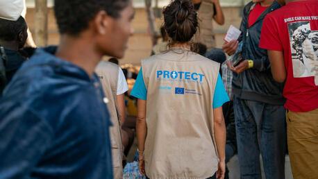 On Sept. 26, 2023, a UNICEF staff member works at the reception center on the island of Lampedusa, Italy.