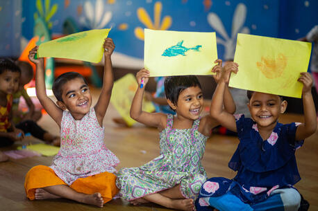 Children participate in a learning activity at a UNICEF-supported day care center providing early childhood care and development support in Gazipur, Bangladesh.