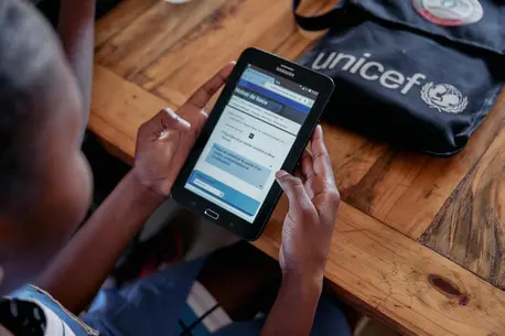 A high school student uses a tablet to access online courses at the Mahajanga’s Public General Education College Charles Renel in the Boeny Region of Madagascar.