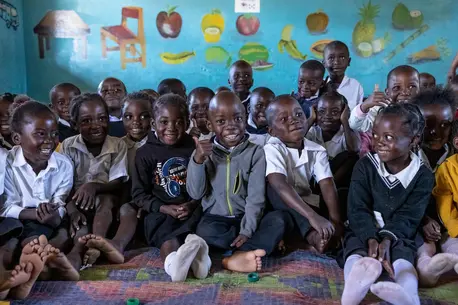 First graders sit on the floor at Bethel Primary School in Katete district, southern Zambia.