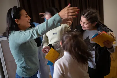 A group session for refugee adolescents and parents in Armenia.