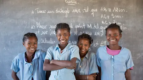 Soanafiny (second from the left), 14, studies in the secondary school of Berano (Anosy region). Thanks to the catch-up class (Let Us Learn), a UNICEF supported program she is now studying in third grade after stopping the school for a year.