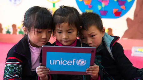 Children looking at a school supplied tablet