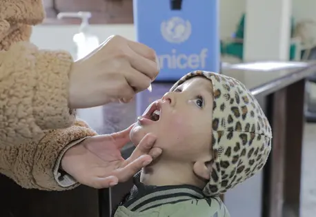 A child receives the oral polio vaccine at Sabra health clinic in Gaza City on Feb. 22, 2025.