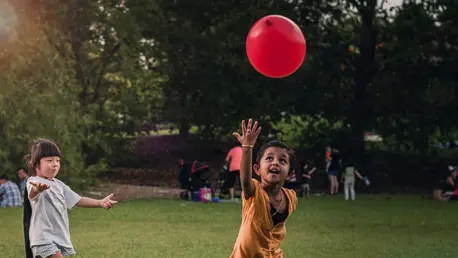 Children playing with a balloon
