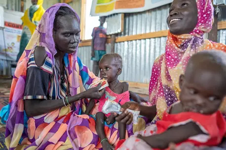 On July 29, 2024, a severely malnourished child is fed ready-to-use therapeutic food at the UNICEF-supported Payuer Nutrition Center in Renk county, South Sudan.