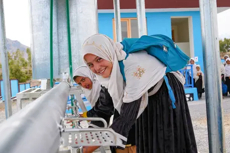 Students wash their hands after using the latrine at Soroubi Girls’ School in Nazyan district, Nangarhar, Afghanistan.