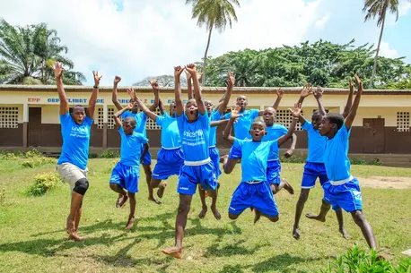 UNICEF-supported children dancing in Cote d'Ivoire