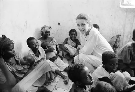 UNICEF Goodwill Ambassador Audrey Hepburn meets mothers and children greets children and women at a feeding center in Mogadiscio, Somalia in 1992.