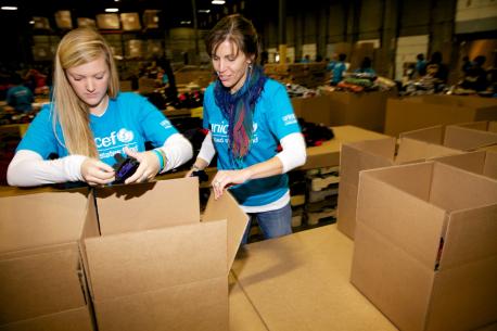 UNICEF Packs Boxes with Humanitarian Supplies