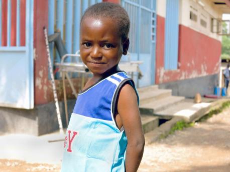 Vandy Jawad, 7, stands in the city of Kenema, Eastern Province, Sierra Leone. He is a survivor of Ebola virus disease .