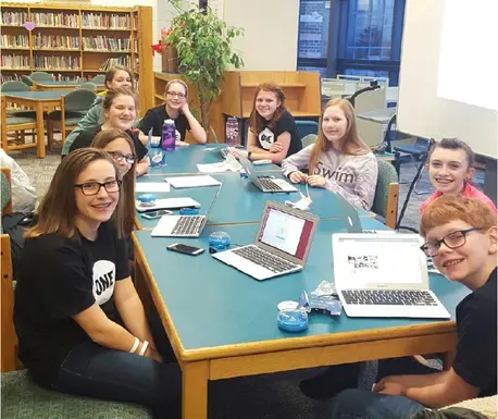 Kids at a Library Table