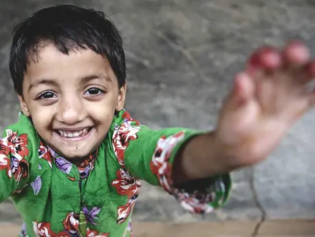 Child Reaching Arms Out