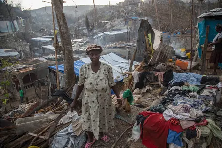 Person Walking Amongst Destruction