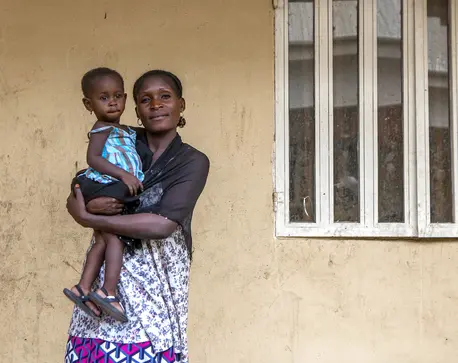 Woman Holding Child