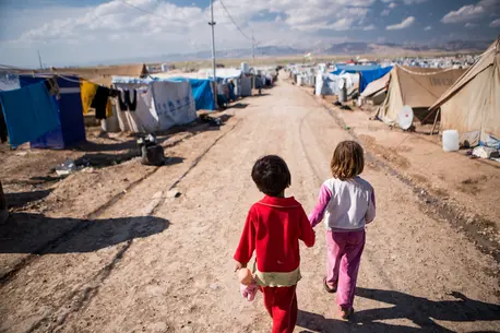 Children holding Hands and Walking
