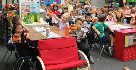 1st Graders at Bell School show off their Trick-or-Treat for UNICEF boxes