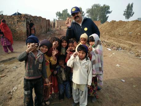 AG Nosherwan Khan with children in rural Pakistan, 2017.