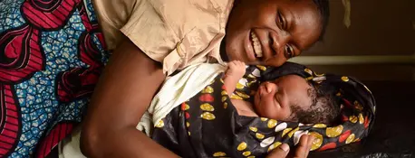 Woman Hugging Baby
