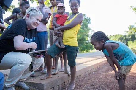 Sonja Hönig Schough, the president of Zonta International discussing with a girl in Marofarihy village - Vatovavy Fitovinany region.
