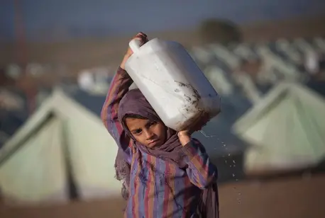 Child Holding Container
