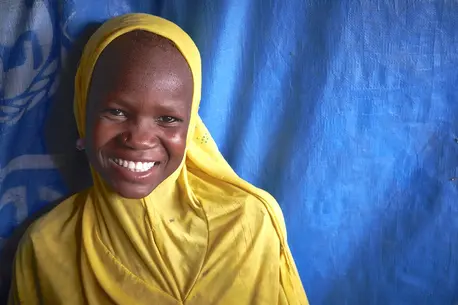 Girl Smiling with Head Wrap