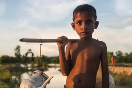 Child Carrying Water