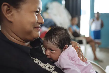 Woman Holding a Baby