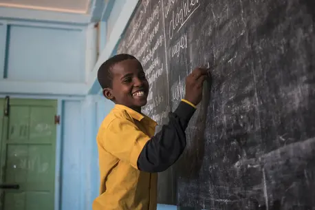 boy at chalkboard