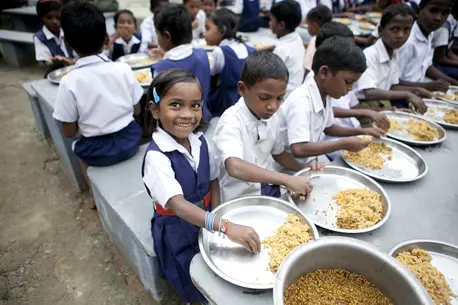 Children in India enjoying a meal at school Children in India enjoying a meal at school
