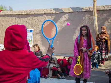 Saima, 12, plays with other girls her age at a UNICEF-supported Child-Friendly Space in Nangarhar province, eastern Afghanistan. Saima, 12, plays with other girls her age at a UNICEF-supported Child-Friendly Space in Nangarhar province, eastern Afghanistan.