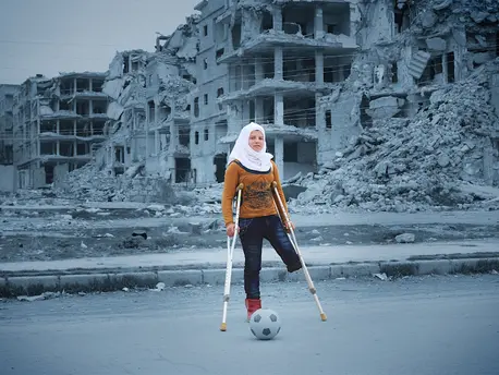 Injured during a bomb attack in Syria's civil war, Saja dreams of one day taking part in the Special Olympics. She practices doing aerial flips every day in her tiny apartment. “I love playing football. When I play football, I don’t feel like I’ve lost an