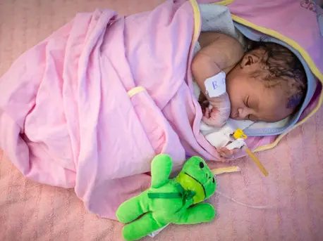 An infant sleeps in the neonatal intensive care unit at Assosa General Hospital in Benishangul-Gumuz, Ethiopia. An infant sleeps in the neonatal intensive care unit at Assosa General Hospital in Benishangul-Gumuz, Ethiopia.
