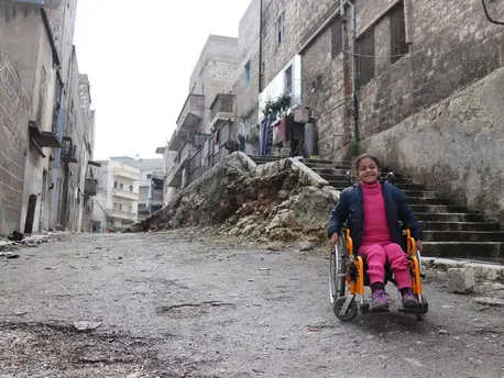 After Hanaa, 8, was paralyzed by an exploding bomb in Aleppo, Syria, volunteers at a UNICEF-supported Child Friendly Space helped her get back to learning and playing. After Hanaa, 8, was paralyzed by an exploding bomb in Aleppo, Syria, volunteers at a UNICEF-supported Child Friendly Space helped her get back to learning and playing.
