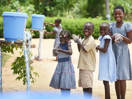 Students wash their hands at school in Essankro in Côte d'Ivoire in 2018. Unicef, global handwashing day, handwashing, sanitation, WASH, education