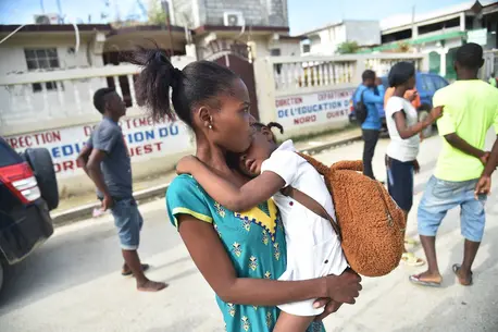 Woman Holding Child