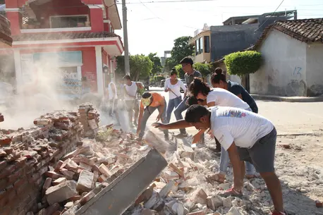 On 9 September 2017 in Oaxaca, Mexico, adolescent volunteers from San Blas Atempa help to remove debris and clear the streets of San Mateo del Mar affected by the earthquake. On 9 September 2017 in Oaxaca, Mexico, adolescent volunteers from San Blas Atempa help to remove debris and clear the streets of San Mateo del Mar affected by the earthquake.