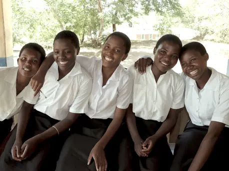 The K.I.N.D. Fund, a partnership between UNICEF and MSNBC's Lawrence O'Donnell, provides scholarships to students in Malawi like Rehema, far right. The K.I.N.D. Fund, a partnership between UNICEF and MSNBC's Lawrence O'Donnell, provides scholarships to students in Malawi like Rehema, far right.