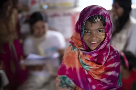 Girl in Pink Scarf Smiling