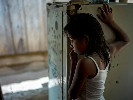 Honduras, 2016. This 8-year-old girl's older brother lost his leg when he fell off a freight train trying to get to the U.S. He hoped to get a job and send money back home to his impoverished family. immigrant children, migrant children, unicef, honduras, child exploitation, undocumented immigrants, immigration