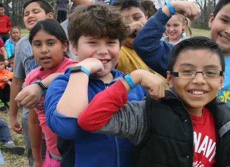 Children Flexing Arms