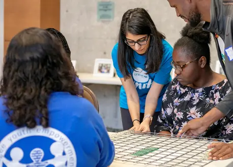 UNICEF Personnel Helping Child