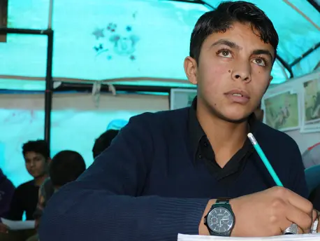 Ahmad is continuing his education in a Syrian IDP camp using a Self-Learning Program supported by Educate A Child and UNICEF USA. Ahmad is continuing his education in a Syrian IDP camp using a Self-Learning Program supported by Educate A Child and UNICEF USA.